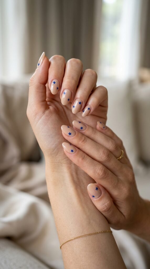 Minimalist-Nude-Nails-with-Tiny-Blue-Stars