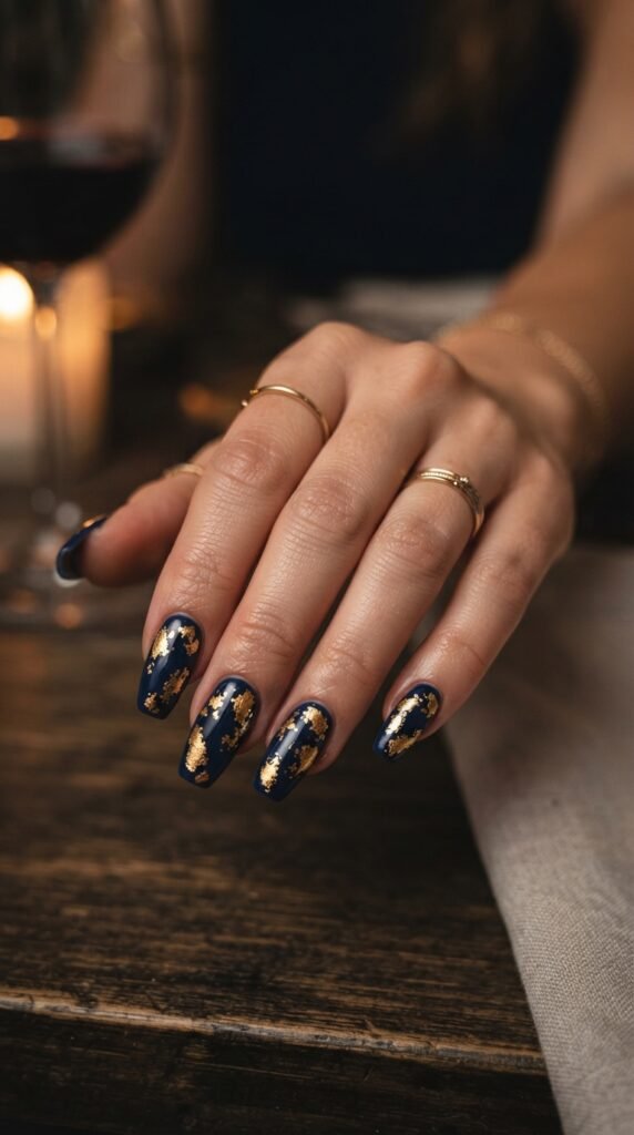 The Moody Navy and Gold Foil Nails