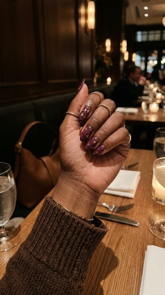 Plum and Gold Starburst Nails