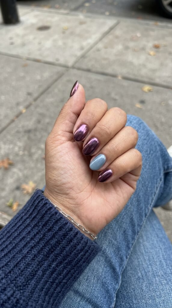 Plum Chrome Nails With a Cool Blue Accent